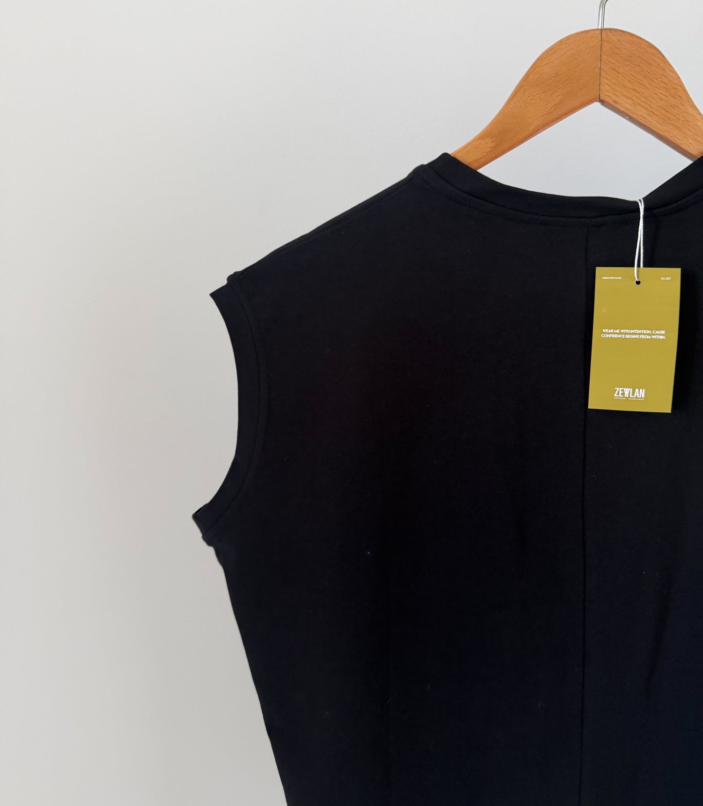 Rounded Sleeveless Top — Black