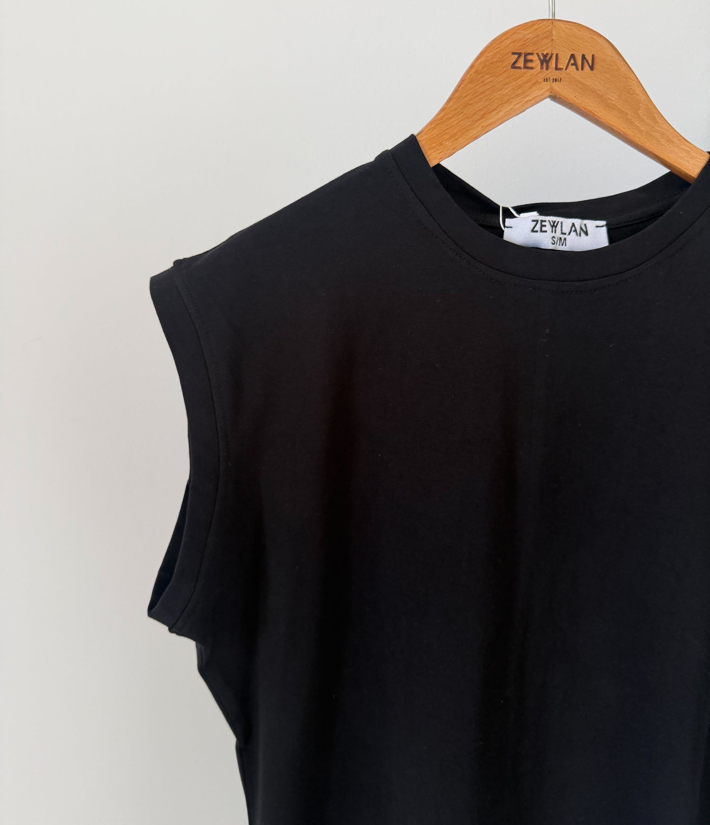 Rounded Sleeveless Top — Black