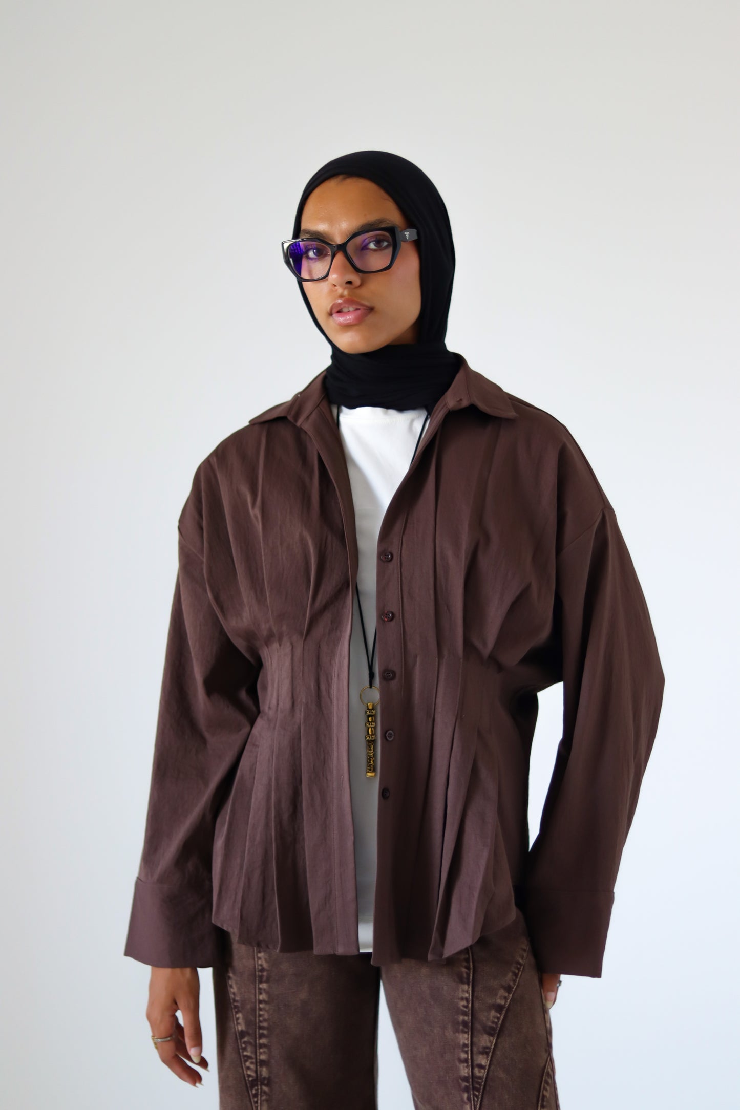 Pleated Round Shirt — Brown