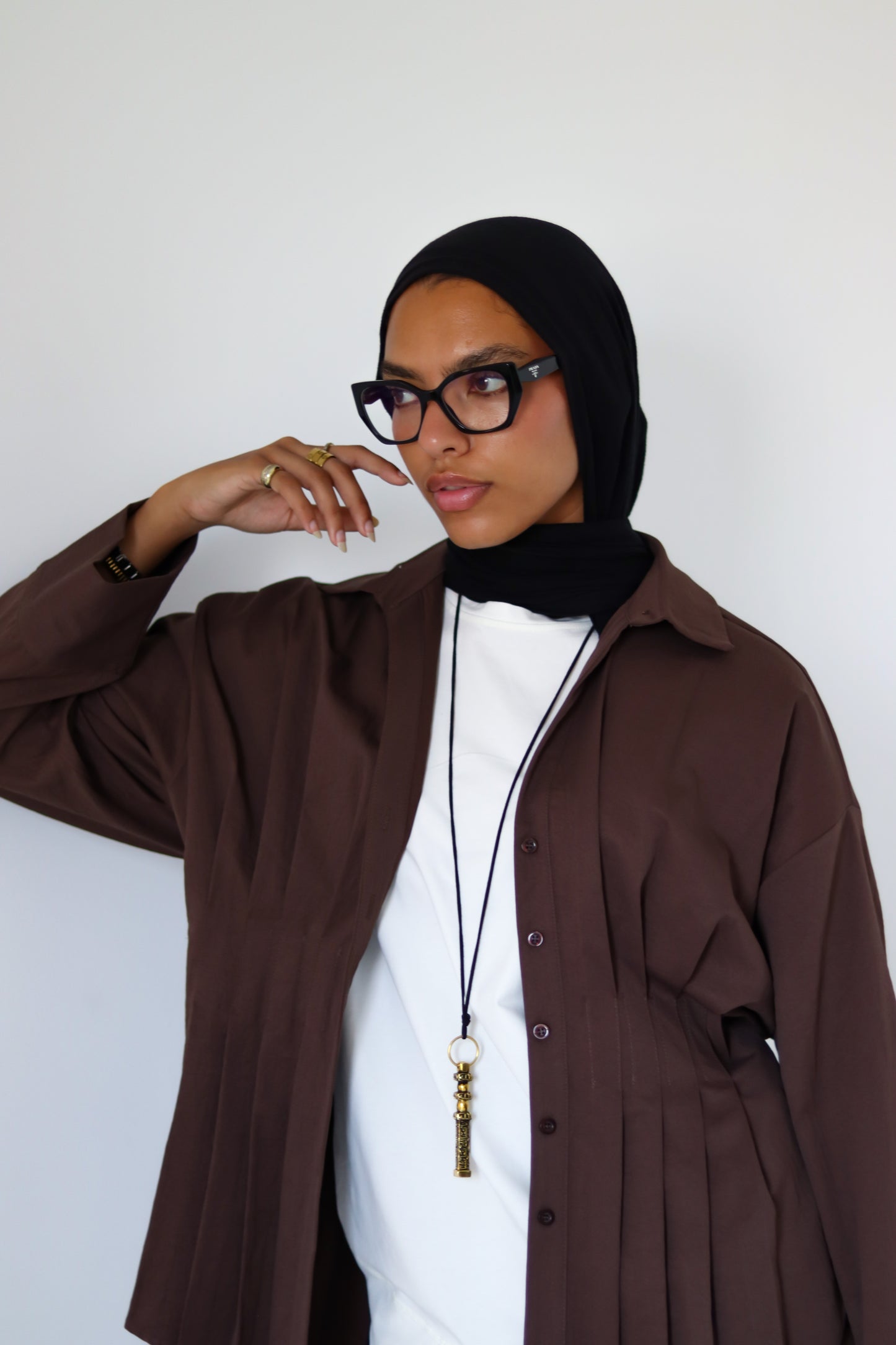 Pleated Round Shirt — Brown