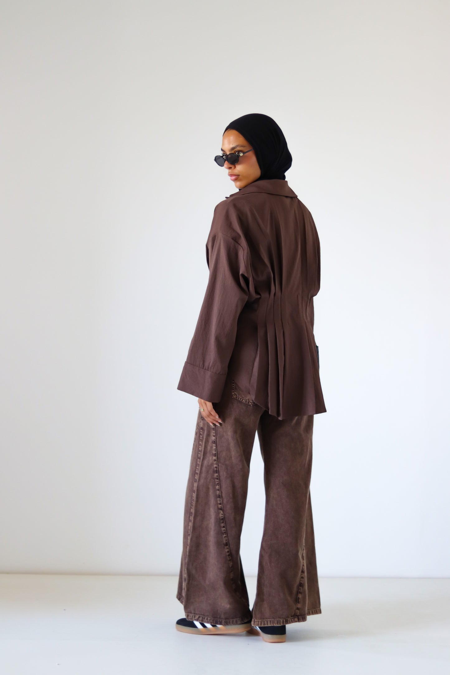 Pleated Round Shirt — Brown